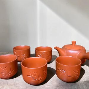 Vintage japansk teservis i röd lack