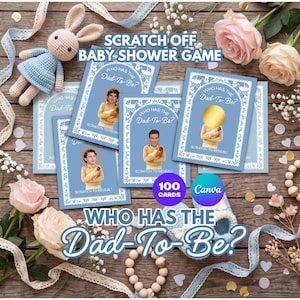 May include: A set of 100 scratch-off baby shower game cards featuring a blue border, white lace-style accents, and the text Who Has The Dad-To-Be? Each card displays an illustration of a person in a yellow sweater holding a baby.