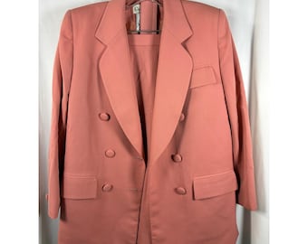 Traje de falda y chaqueta Christian Dior Vintage color rosa salmón 100% lana.