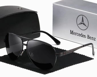 Gafas de sol de aviador clásicas, lentes polarizadas oscuras, montura metálica ligera, ideales para conducir.