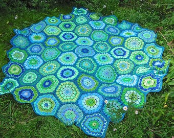 Hexagon flower blanket pattern. So you can make it yourself.
