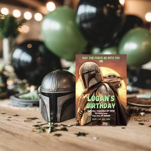 May include: A metallic Mandalorian helmet and a birthday invitation featuring the Mandalorian and Grogu. The invitation reads "May the Force Be With You On Logan's Birthday" with event details. Green and black balloons are in the background.