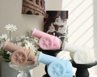 Vela de cera de soja en forma de mini cañón: un artículo decorativo creativo y único.