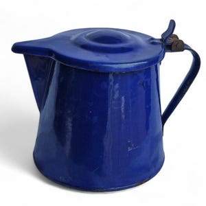May include: A set of three ceramic mugs with a speckled, matte finish. Each mug features a different color: light blue, cream, and gray. The mugs have a simple, modern design and a comfortable handle.