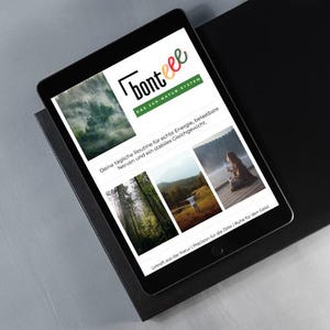 Könnte beinhalten: Ein schwarzes Tablet, das eine Website mit dem Text "bonteee DAS 24H NATUR-SYSTEM" anzeigt. Die Website zeigt Bilder von Naturszenen und Text auf Deutsch. Das Tablet liegt auf einer schwarzen Oberfläche.