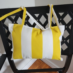 Outdoor pillow with ties 13&quot; x 9&quot; yellow and white striped outdoor fabric, ties for anchoring to chair, custom made
