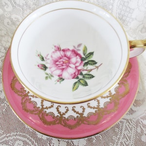 Vintage pink teacup and saucer by Aynsley, England, cabbage rose center, beautiful gold border, excellent condition