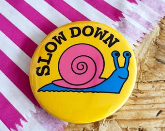 Slow Down Snail Badge or Magnet