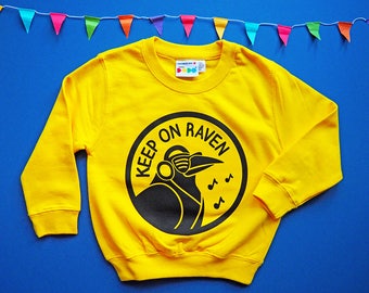 Keep On Raven Funny Kids Sweater in Yellow