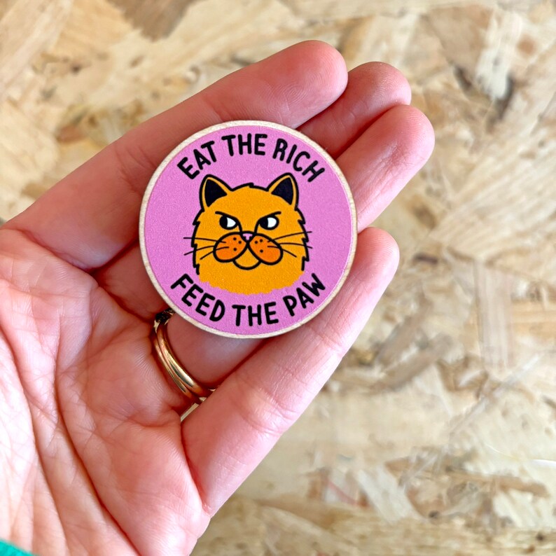 Eat The Rich, Feed The Paw Wooden Pin Badge image 2