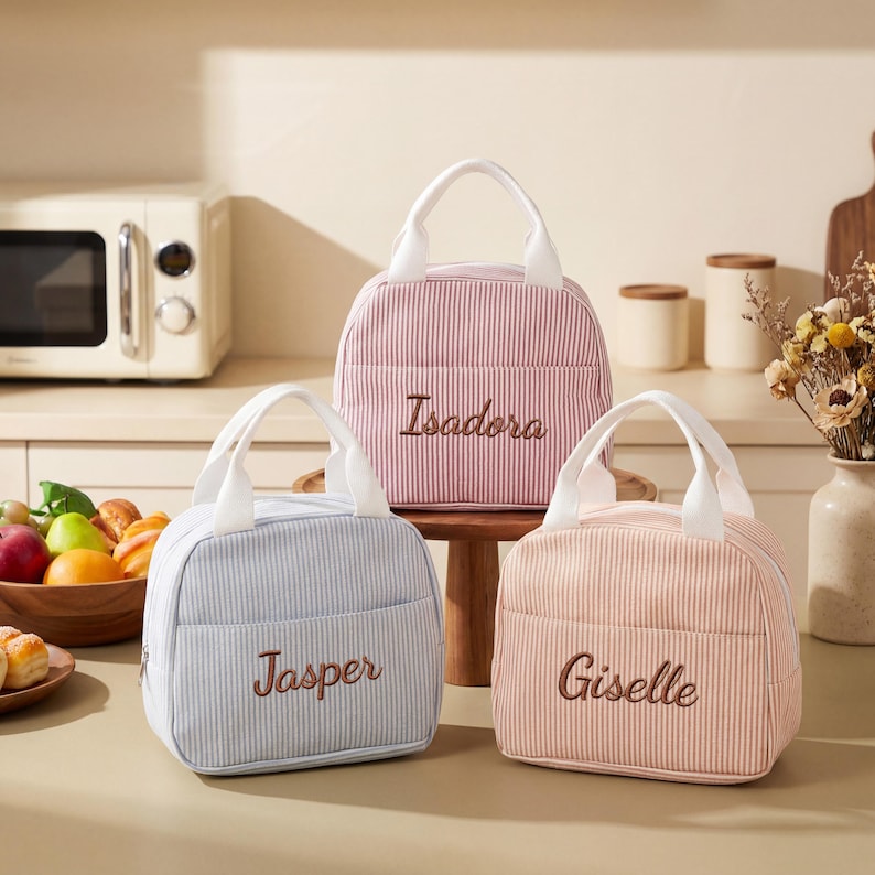 May include: A set of three ceramic mugs with a speckled, matte finish. The mugs are in shades of cream, light gray, and dark gray. Each mug has a simple, minimalist design, perfect for coffee or tea.