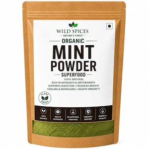 May include: A brown kraft paper pouch containing organic mint powder superfood by Wild Spices. The label features the text Wild Spices, Organic Mint Powder, Superfood, 100% Natural, and lists benefits like supports digestion and boosts immunity.
