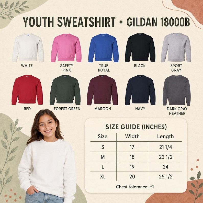 May include: A Gildan 18000B youth sweatshirt color chart featuring ten options: white, safety pink, true royal, black, sport gray, red, forest green, maroon, navy, and dark gray heather, with a size guide in inches for sizes S through XL.