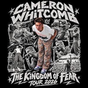 May include: A black graphic t-shirt featuring a collage of Cameron Whitcomb performing on stage. The text reads CAMERON WHITCOMB at the top and THE KINGDOM OF FEAR TOUR 2026 at the bottom. The central image shows a person in a white t-shirt.