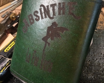 Leather covered hip flasks in a range of colours, personalised for groom / best man / groomsman / yourself. Free U.K. delivery
