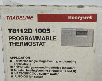 Thermostat électronique programmable basse tension T8112D1005 de Honeywell - Boîte ouverte