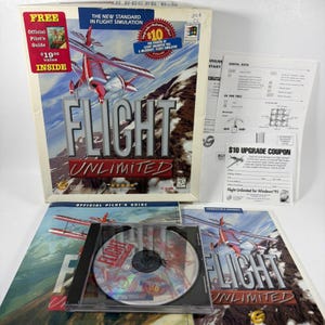 May include: A vintage PC game box set for Flight Unlimited. The box features a red and white biplane graphic against a mountain backdrop. Includes a CD-ROM, manuals, and a coupon. The game is for Windows '95.