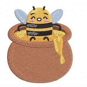 May include: A cute embroidered design featuring a smiling bee with black and yellow stripes, light blue wings, and a pot of honey. The pot is brown with a textured appearance, and the honey is dripping down the side. The bee is sitting in the honey.