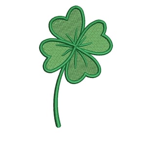 Könnte beinhalten: Ein grün gesticktes Kleeblatt mit vier herzförmigen Blättern und einem Stiel. Das Kleeblatt ist ein Glückssymbol, das oft mit dem St. Patrick's Day in Verbindung gebracht wird.