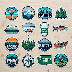 May include: A collection of colorful stickers featuring Pacific Northwest themes. Designs include the Seattle Space Needle, mountains, evergreen trees, a ferry, rain with an umbrella, a coffee cup, a fish, a canoe, and a cyclist.