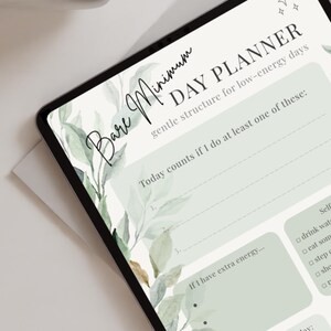 May include: A digital day planner on a tablet with the text "Bare Minimum Day Planner" and "gentle structure for low-energy days." The planner has sections for daily tasks and goals, with a soft green and white floral design.