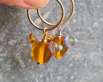 Little bird hoop earrings, handmade in murano glass on goldfill endless hoops.