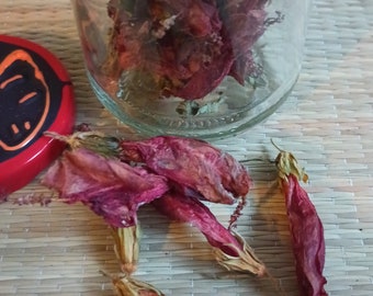 Jar of dried red Hibiscus flowers
