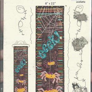 May include: A Halloween-themed fabric banner with a spider web design and the word "Eeek!". The banner is approximately 6 inches by 22 inches. It features colorful spiders and a dark background, perfect for seasonal decor.