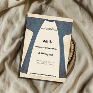 May include: An invitation card with a cream background and a blue patterned border. The card reads "ALI'S CIRCUMCISION CEREMONY" and includes the date "15 January 2026" and an address. The top of the card has Arabic text.