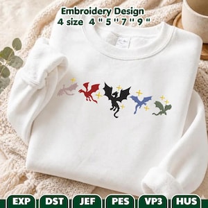 May include: A white crewneck sweatshirt featuring an embroidered design of five small dragons in light pink, red, black, blue, and green, accented with yellow plus-sign stars. The text Embroidery Design 4 size 4" 5" 7" 9" is printed above.