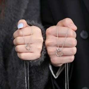 Interlocking Twisted Ring Pendant Necklace, Silver Tone with Clear & Black CZ, Couples Jewelry, Everyday Wear Gift for Him and Her