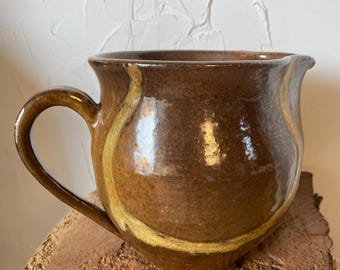 Brown Pottery Pitcher