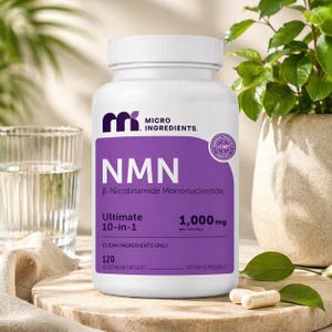 May include: A white bottle of Micro Ingredients NMN dietary supplement with a purple label. The label includes the text "NMN", "1,000 mg", and "120 vegetarian capsules". Two capsules are visible next to the bottle.