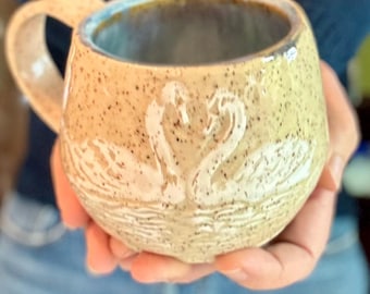 Coffee mug with swans