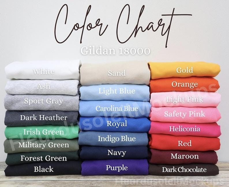 Peut inclure: Un nuancier pr&eacute;sente des sweat-shirts Gildan 18000 pli&eacute;s dans diverses couleurs. Le nuancier comprend des nuances comme le blanc, le gris cendr&eacute;, le gris sport, le heather fonc&eacute;, le vert irlandais, le vert militaire, le vert for&ecirc;t et le noir. D'autres couleurs incluent sable, bleu clair, bleu Caroline, royal, bleu indigo, marine et violet.