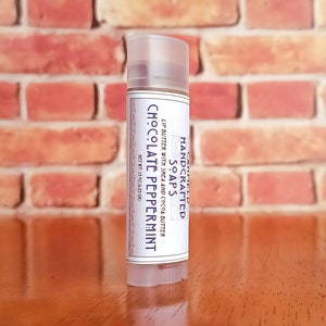 Chocolate Peppermint Shea and Cocoa Butter Lip Balm Clear Oval tube image 1