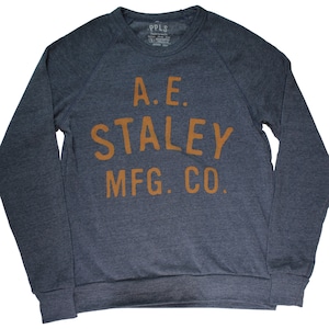 May include: A navy blue long-sleeved sweatshirt with a vintage-style logo in orange that reads "A.E. Staley Mfg. Co."