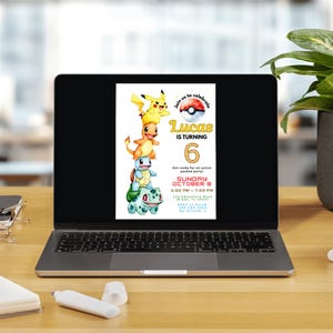 May include: A laptop displays a colorful birthday invitation. The invitation features a stack of cartoon characters, the text "Lucas is turning 6," and event details. The laptop sits on a wooden desk with office supplies and a potted plant.