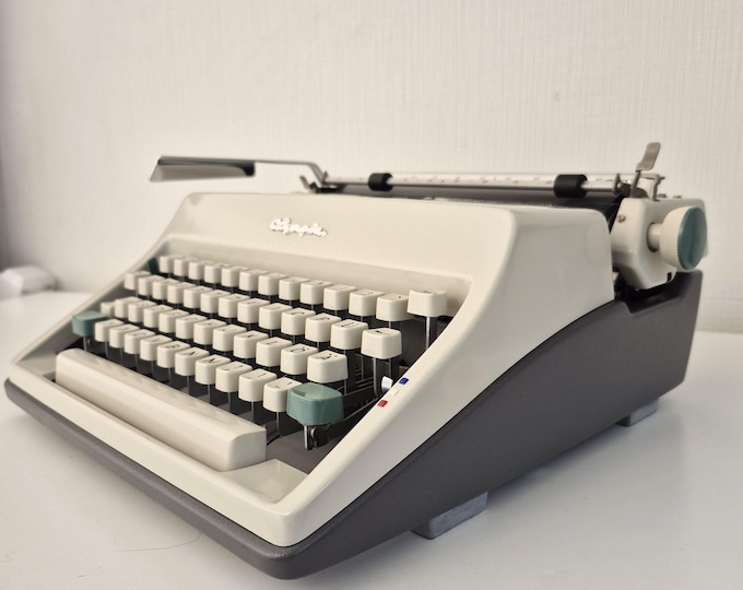 Featured listing image: Olympia SM8 Typewriter – Vintage 1970s – Fully Serviced, Top Condition with Case & New Ribbon