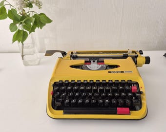 Macchina da scrivere Brother 440TR vintage (anni '70) – Gialla – Condizioni eccellenti e perfettamente funzionante – Design retrò Pop Art – QWERTZ