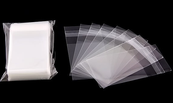 Sandwich sheets, soft formable plastic and thin plastic folio.