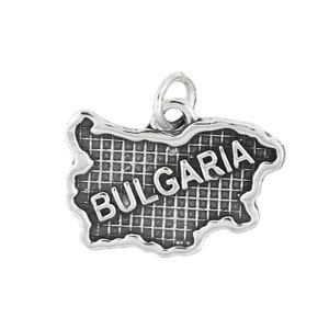 May include: Silver charm in the shape of Bulgaria with the word "BULGARIA" inscribed on it.