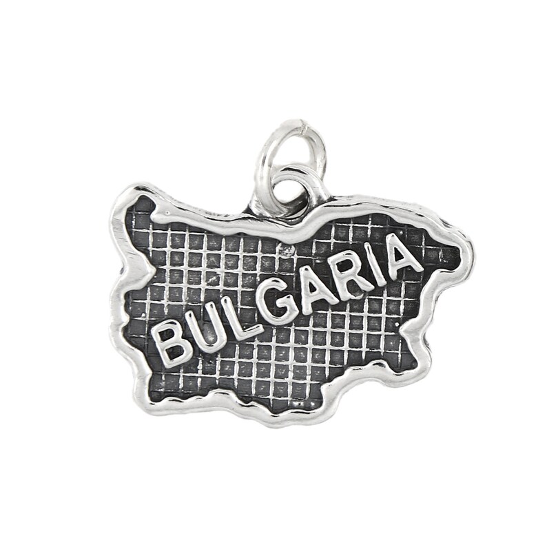 May include: Silver charm in the shape of Bulgaria with the word "BULGARIA" inscribed on it.