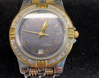 Montre habillée à quartz Bulova vintage pour femme