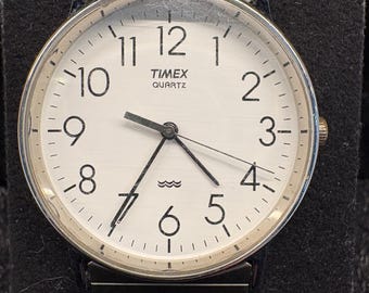 Vintage Timex quartzhorloge zilver met witte wijzerplaat