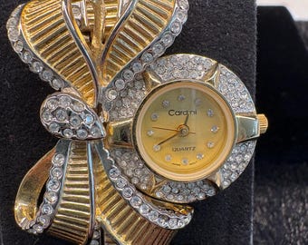 Montre tendance à quartz Cardini vintage pour femme avec nœud distinctif orné de strass