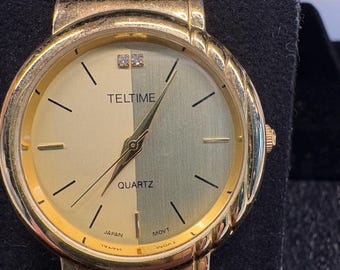 Vintage Ladies Teltime Quartz Analog Dress Watch Two Tone Split Gold Dial