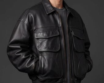 May include: A black leather jacket featuring a classic collar, a full-length front zipper, and two large flap pockets on the chest. The jacket includes ribbed cuffs and a ribbed hem, with additional side pockets integrated into the lower front panels.