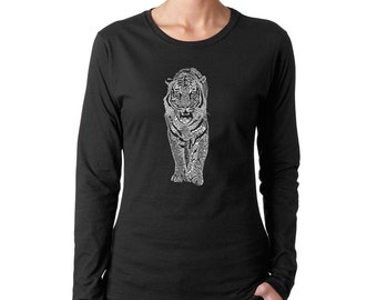 May include: Black long-sleeve t-shirt with a white graphic of a tiger made of words.