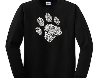 May include: Black long-sleeve t-shirt with a white paw print design. The paw print is made up of words related to dogs, such as "good boy", "fetch", and "walk".